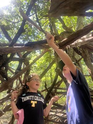 kids in shelter in nature